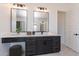 Modern bathroom with dual vanities, sleek fixtures, and ample counter space at 13914 E Barwick Dr, Scottsdale, AZ 85262