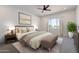 Serene main bedroom with soft lighting, neutral tones, and a comfortable king-size bed at 13914 E Barwick Dr, Scottsdale, AZ 85262