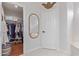 Bathroom hallway area leading to the closet with built-in shelving at 15816 W Amelia Dr, Goodyear, AZ 85395