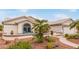 Beautiful house featuring low-maintenance landscaping, a walkway, and mature trees at 15816 W Amelia Dr, Goodyear, AZ 85395