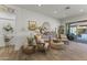 Elegant living space with shiplap walls, tasteful furnishings, and access to outdoor amenities at 16026 W Cortez St, Surprise, AZ 85379