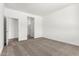 A clean bedroom featuring neutral carpet and bright white walls at 17547 W Lupine Ave, Goodyear, AZ 85338