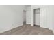 Neutral bedroom with carpet, closet, and white trim at 17547 W Lupine Ave, Goodyear, AZ 85338