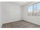 A naturally lit bedroom with a view of the neighborhood at 17547 W Lupine Ave, Goodyear, AZ 85338