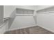 Walk-in closet with neutral carpet and closet rod at 17547 W Lupine Ave, Goodyear, AZ 85338