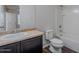 Cozy bathroom featuring a single vanity, new fixtures, and a shower-tub combo with tile surround at 1940 N 78Th Gln, Phoenix, AZ 85035