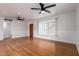 Bright living room with beautiful wood floors and lots of natural light at 2256 W Ella St, Mesa, AZ 85201