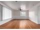 Expansive living room with lots of natural light and lovely wood floors at 2256 W Ella St, Mesa, AZ 85201