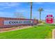 Welcoming Cooley Station community sign with lush greenery, showcasing the Fulton Homes at 2601 S Entwistle St, Gilbert, AZ 85295