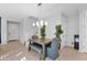 Bright dining area with modern table, stylish chairs, and ample natural light from the nearby windows at 2601 S Entwistle St, Gilbert, AZ 85295