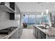 Modern kitchen featuring gray cabinets, granite countertops, stainless steel appliances and tile backsplash at 2601 S Entwistle St, Gilbert, AZ 85295