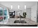 Close up of the kitchen island, granite countertops, and a view to the living room at 2601 S Entwistle St, Gilbert, AZ 85295