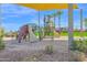 Vibrant community playground with slides, climbing structures, and shade, perfect for Gathering fun at 2601 S Entwistle St, Gilbert, AZ 85295