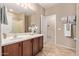 Bathroom featuring tile floors, vanity with granite counters, and a shower-tub combination at 3044 E Trigger Way, Gilbert, AZ 85297