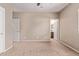 Neutral bedroom with carpeted floors and adjoining bathroom at 3044 E Trigger Way, Gilbert, AZ 85297