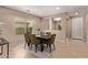 Formal dining area with modern decor, neutral walls, and bright window at 3044 E Trigger Way, Gilbert, AZ 85297