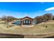 Scenic gazebo by the pond with picturesque landscaping and walking paths at 3044 E Trigger Way, Gilbert, AZ 85297