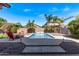 Backyard oasis features a sparkling pool and deck, perfect for relaxing at 3044 E Trigger Way, Gilbert, AZ 85297