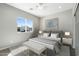 Cozy bedroom with modern decor, neutral color palette, and ample natural light at 410 S 98Th Pl, Mesa, AZ 85208