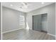 Bedroom with a window and sliding closet doors at 410 S 98Th Pl, Mesa, AZ 85208