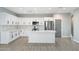 Modern kitchen featuring white cabinets, stainless steel appliances, and quartz countertops at 410 S 98Th Pl, Mesa, AZ 85208