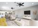 Inviting living room open to kitchen and dining area with neutral tones and modern decor at 410 S 98Th Pl, Mesa, AZ 85208