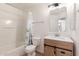 Bright bathroom offers modern fixtures, shower and barn door vanity at 453 N Alder Ct, Gilbert, AZ 85233