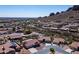 Expansive aerial view of a desert community with mountains in the distance at 4846 S Rimrock Loop, Gold Canyon, AZ 85118