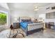 Inviting bedroom with stylish decor, a ceiling fan, and a peek into an en-suite bathroom at 4846 S Rimrock Loop, Gold Canyon, AZ 85118