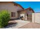 Exterior view of home with patio, barbecue and gated entry at 4846 S Rimrock Loop, Gold Canyon, AZ 85118