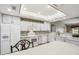 Well-lit kitchen with white cabinets, modern appliances, and plenty of counter space at 4846 S Rimrock Loop, Gold Canyon, AZ 85118