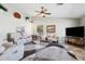 Cozy living room featuring a ceiling fan and neutral decor at 4846 S Rimrock Loop, Gold Canyon, AZ 85118