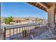 Scenic porch view overlooking a quiet street and neighboring homes at 4846 S Rimrock Loop, Gold Canyon, AZ 85118