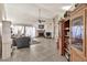 Spacious living room boasting high ceilings, a fireplace, and a mix of furniture styles at 4913 E Halifax St, Mesa, AZ 85205