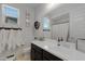 Bright bathroom with a large sink, a mirror, and modern fixtures at 5431 S Canyon Rim --, Mesa, AZ 85212