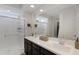 Contemporary main bathroom with dual sinks, a walk-in shower, and ample counter space at 5431 S Canyon Rim --, Mesa, AZ 85212