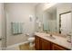 Bathroom features a light colored counter, modern sink, and decorative wall art at 5450 E Deer Valley Dr # 3008, Phoenix, AZ 85054