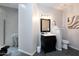 Well-lit bathroom featuring a classic vanity and step-in shower at 6132 E Yucca St, Scottsdale, AZ 85254