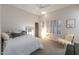 Cozy bedroom with neutral walls, carpet floors, shuttered windows, and modern decor at 6132 E Yucca St, Scottsdale, AZ 85254