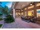 Inviting covered patio with comfortable seating, ceiling fans, and stylish decor overlooking the pool at 6132 E Yucca St, Scottsdale, AZ 85254