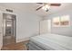 Bedroom includes wood look floors, a closet and neutral colored walls at 641 N 61St Pl, Mesa, AZ 85205