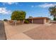 Charming single-story home with mature trees, a well-maintained yard and large driveway at 641 N 61St Pl, Mesa, AZ 85205