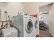 Functional laundry room with modern washer and dryer units at 641 N 61St Pl, Mesa, AZ 85205