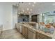 Modern kitchen featuring granite countertops, stainless steel appliances, and stylish finishes, perfect for cooking and entertaining at 7180 E Kierland Blvd # 807, Scottsdale, AZ 85254