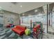 Recreation room offering a basketball court visible through glass walls, complete with stylish seating at 7180 E Kierland Blvd # 807, Scottsdale, AZ 85254