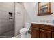 Stylish bathroom boasts modern fixtures, marble counters, a walk-in shower, and neutral tiling at 7482 S Mccormick Way, Queen Creek, AZ 85142