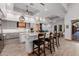 Open kitchen with gray cabinetry and modern finishes at 7482 S Mccormick Way, Queen Creek, AZ 85142