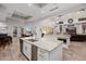 Large kitchen island with stainless steel appliances, dishwasher, and sink at 7482 S Mccormick Way, Queen Creek, AZ 85142