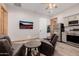 Cozy sitting area with recliners, a TV, and a kitchenette for added convenience at 7482 S Mccormick Way, Queen Creek, AZ 85142