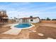 Inviting backyard pool surrounded by grass and minimal landscaping, perfect for outdoor enjoyment at 8220 N 35Th Ave, Phoenix, AZ 85051